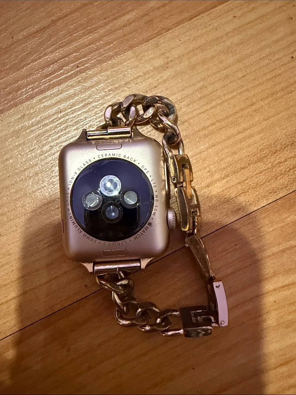 Apple Gold Smartwatch with Chain Link Bracelet band and White Charger Series 3